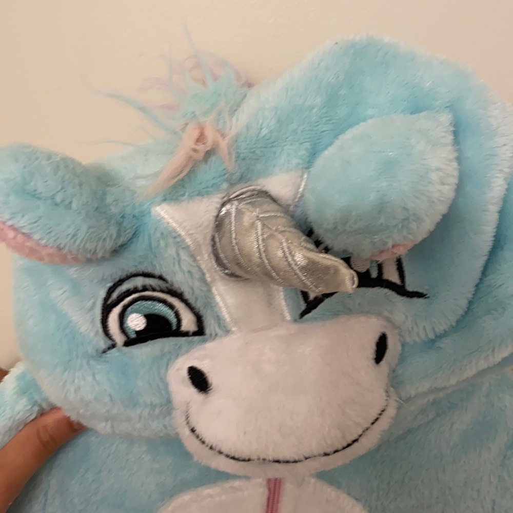 Unicorn costume/ pjs. Is ultra fuzzy, soft and warm. 2T.